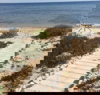Sittin on the Beach - Coogee Beach Accommodation